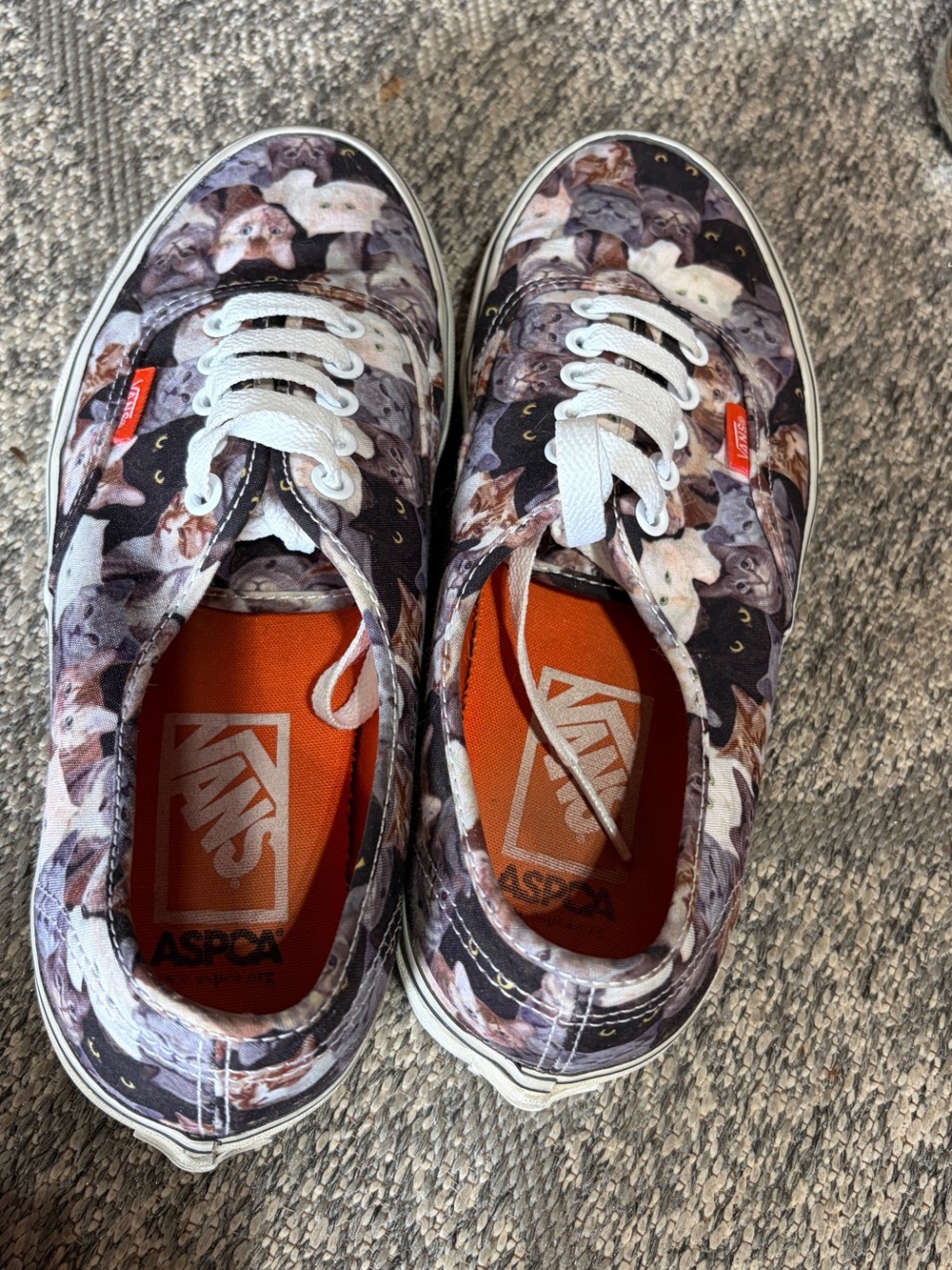 Vans men’s Cat-Print Canvas Sneakers in Black, White, Orange
